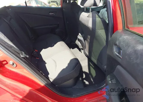 2021 Toyota Prius L Eco from USA, damaged, VIN JTDKAMFU5M3152710